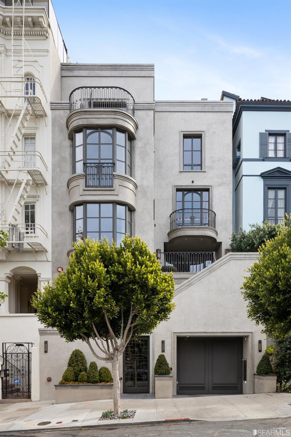 Magnificent Russian Hill residence with incredible architecture and design plus gorgeous city & Bay views. 5+ bedrooms (including separate guest apt), 5.5+ bathrooms, media room, family room, game room, elevator, roofdeck, beautiful garden and more. 5+ car parking.