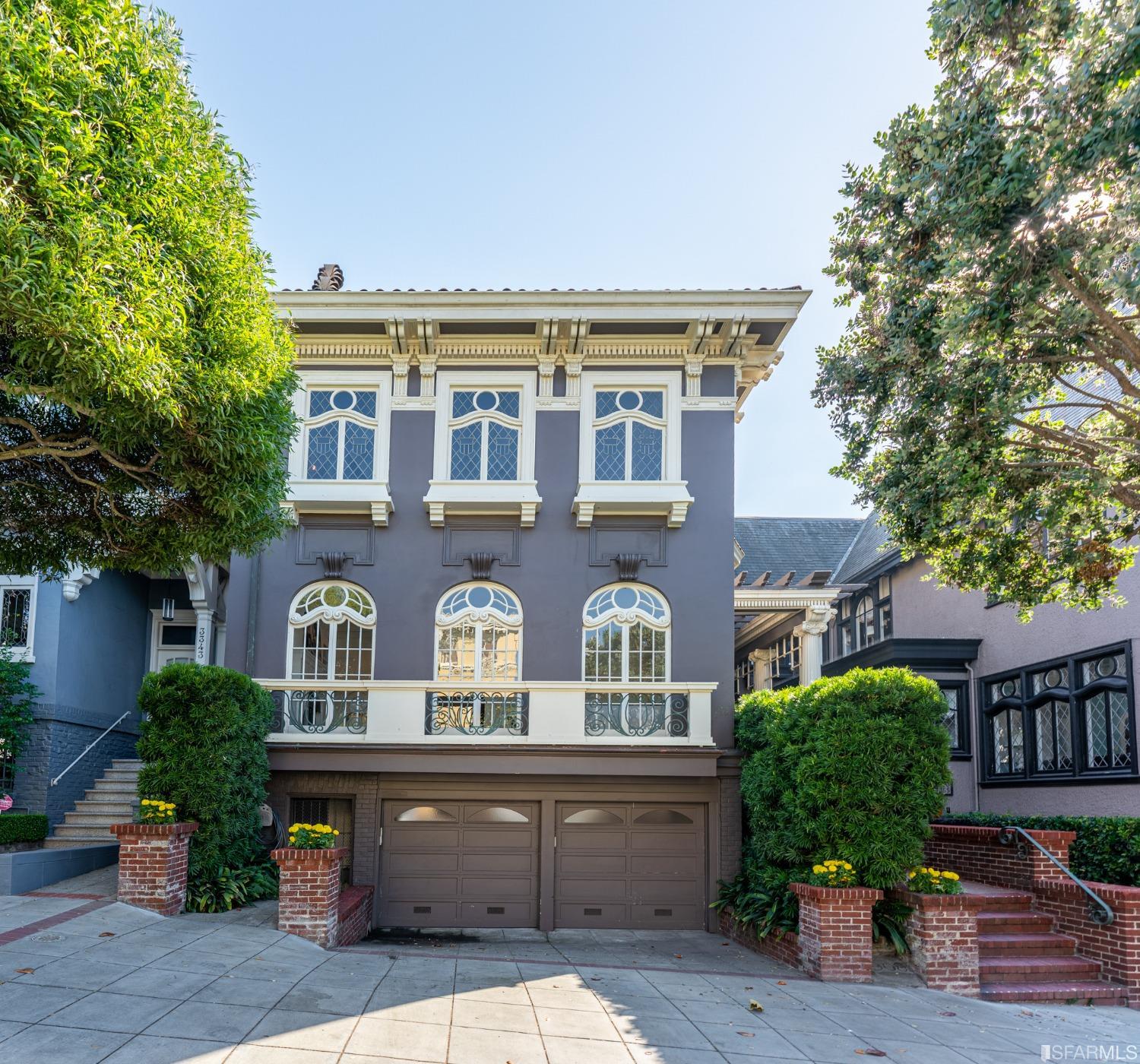 3349 Jackson Street San Francisco, California In the same family since its 1908 construction, this stately 5,424 sq. foot property will impress you with its 8 bedrooms / 6 bathrooms, oversized 36' x 129' lot, and location literally just steps to the Presidio. Upon entering each flat, you are transported to another era with a grand foyer and box-beam ceiling. Gorgeous detailing, hardwood floors, and high ceilings adorn each flat. The expansive living room in each home enjoys an abundance of natural light and features spectacular window craftsmanship. The floor plan impresses with 4 bedrooms / 3 bathrooms for each unit, large primary suites, and peek-a-boo views of the Golden Gate Bridge from the upper flat living room. Laundry in each unit, proximity to Laurel Village retail & the JCC, and convenient garage parking for 3 cars (with 2 EV chargers) complete this incredible property. Don't miss!