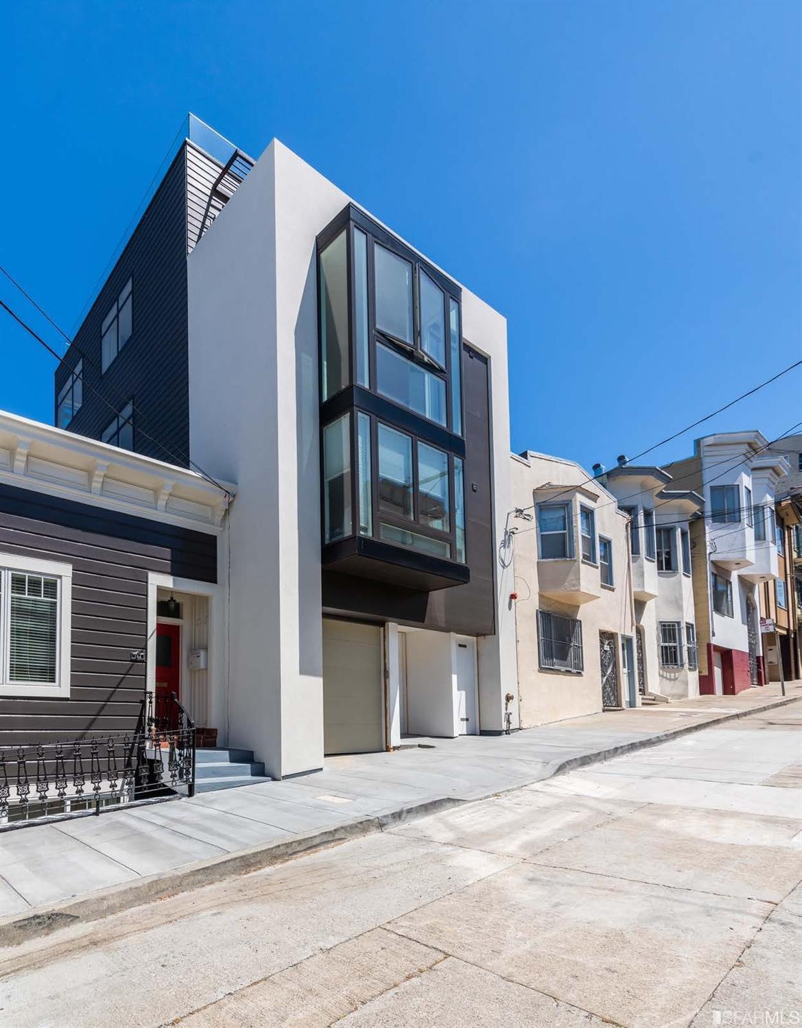 160 Bernard Street San Francisco, California Stunning newer construction, this five story single-family home with four bedrooms and 3.5 bathrooms, can be expanded to include a versatile family property with an additional two bedrooms and 1.5 bathrooms and an entertainment suite. This award-winning architect, and interior designer residence boasts 360 degree views from multiple levels culminating in an entertainer's paradise with two decks from the kitchen/dining level and a meadow on the roof with gas firepit and wide views of the Golden Gate Bridge. The entry level gives private access to the lower floors connected with a double height overlook to the living/kitchen and dining area which in turn opens up to a lovely patio garden landscaped with mature shrubs and trees. The elevator at this level can take you to the top floor and the pinnacle of the home. The fourth level is a wonderful expansive living, dining, working and hosting level with a perfect office set up for working from home, a comfortable lounge space and a fourth bedroom/guest suite with an ensuite bathroom. High above it all is a glass protected roof ensuring the panorama remains uninterrupted. Gallanter & Jones heated seats and a gas firepit. you can enjoy the sunsets and the view of the Golden Gate Bridge. Double stacked garage, radiant heat.