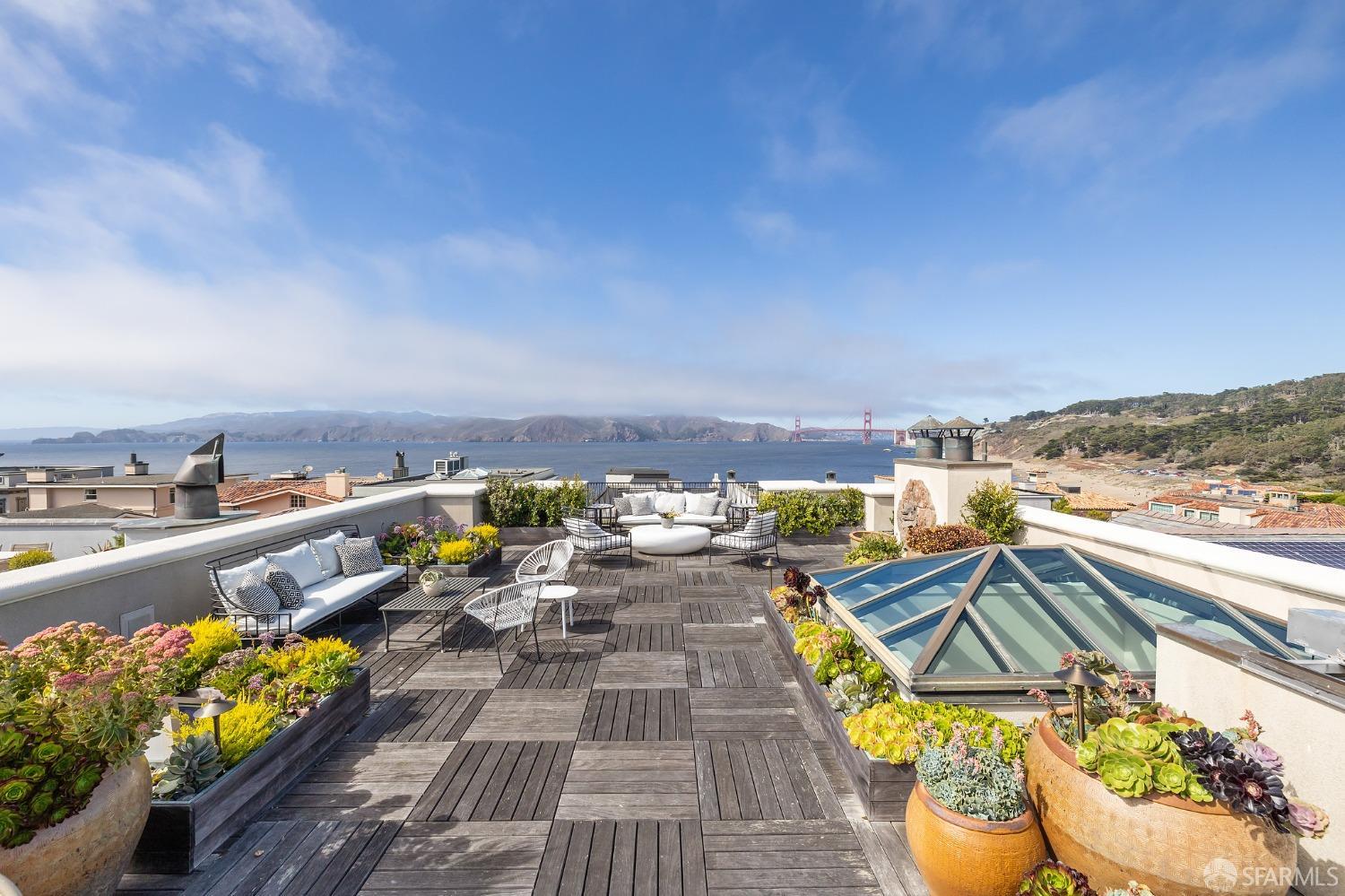 Listen to the sound of the ocean and gaze at the Golden Gate Bridge as you fall asleep each night. Near beaches, The Presidio and trails, 125 Sea Cliff Avenue is situated in one of the most sought-after locations in San Francisco's idyllic Sea Cliff neighborhood. Creating wonderful privacy, this remarkable home sits above and back from the street offering incredible views of San Francisco's iconic Golden Gate Bridge, the Marin Headlands, Pacific Ocean, The Presidio & beyond. Spanning three levels, it offers over 4500sf of living space, 4 Bedrooms, 3.5 baths, a lower level media/game room & guest quarters. The main level features a high-end kitchen with breakfast bar that opens to the den, large formal liivng room with gas fireplace and formal dining area.  Wonderful outdoor areas include a charming garden off the family room, plus a retractable skylight that opens to the enormous roof deck with panoramic views. Situated off the rear alley is a 2-car garage.  Truly an amazing location and opportunity!  Full Video and addl info at 125seacliff.com