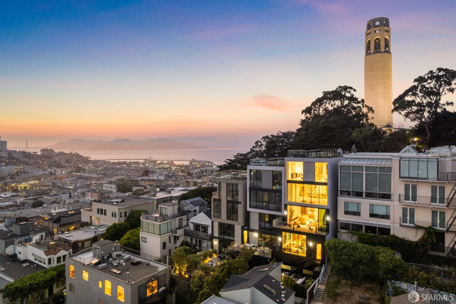 115 Telegraph Hill Boulevard San Francisco, California Showcasing the apex of design, combined with being perfectly situated atop the city, this masterfully built new construction home is nothing short of spectacular. Offering unrivaled views that define San Francisco's iconic beauty, you are treated to a visual performance of the city's most treasured landmarks. Benefiting from the best views in possibly all of San Francisco, rarely are the iconic images of San Francisco pulled into your living room in a way that this residence creates. This 3 bed, 3 full-bath, and 2 half-bath masterpiece is the result of a decade-long journey, evolving from a visionary concept into its present state of breathtaking beauty. The home's design, crafted by the architectural genius Lewis Butler, stands as a testament to its exceptional pedigree and unrivaled quality. In a city known for its stunning vistas, this home far exceeds its competition offering an unparalleled 360-degree perspective that encompasses the full grandeur of both the Golden Gate and Bay Bridges. This home provides the opportunity to fall in love with San Francisco all over again.... and again each day and night.