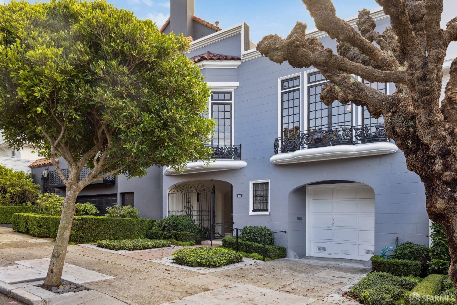 Nestled on a tranquil, tree-lined street in Presidio Heights, this delightful 4BD/3BA light-filled home is a rare find w/the perfect balance of formality & informality. Flooded w/ natural light from a huge skylight, the foyer opens to the LR & DR w/rich parquet floors & tall, French doors w/Romeo balconies. The chef's kitchen features Statuario marble counters & opens to a cozy breakfast/sitting room.  Bedrooms, including a luxurious primary suite with abundant closets, are accessed from a sky-lit central hall.  The primary opens to both a sun-drenched deck w/ garden views & a cheery sunroom which may be a nursery or sitting rm. The en suite primary BA features double sinks & a glass-enclosed stall shower.  Downstairs, the spectacular fam rm, with transom-topped, sliding glass doors, opens to the beautifully landscaped garden patio. A BD & BA add versatility to the lower level. Completing this home is a 2-car gar w/interior access & space for an addit'l car off-street in the driveway. Expansion potential - buyer to investigate.  Large lot (approx.) 32' x 127,'  This is a very special home in a fabulous location!