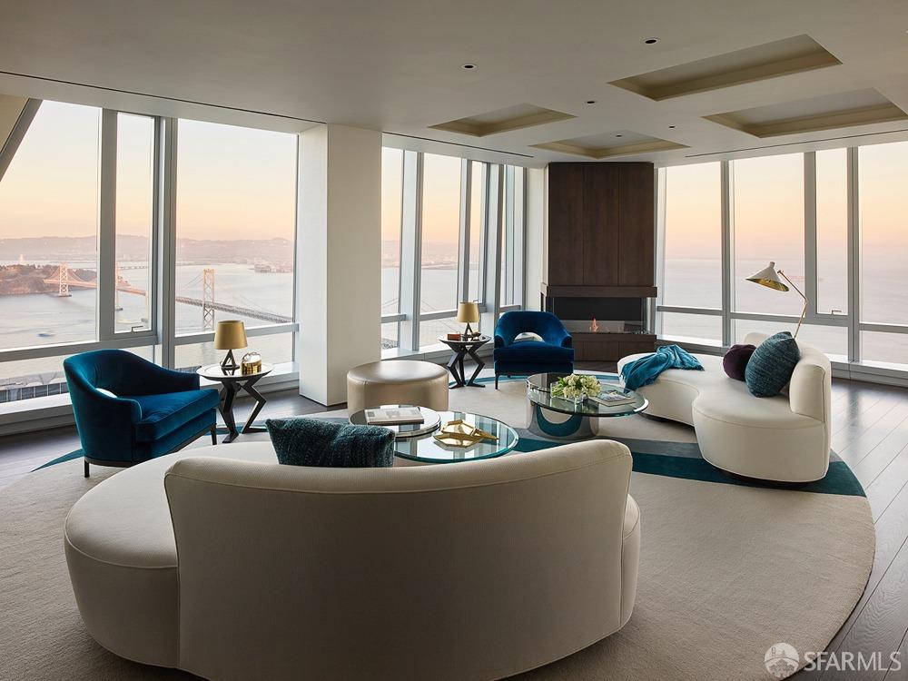 Step into the epitome of luxury living with this exquisite Half Floor Penthouse, now available at an enticing new price. Spanning an impressive 3,256 square feet, this stunning residence boasts 2 bedrooms plus a media/den, 2.5 baths, & unrivaled views of the Bay Bridge, marina, & cityscape. Crafted to perfection by the renowned Kendall Wilkinson Design, this fully furnished sanctuary promises an unparalleled living experience. Step inside & discover Polyform-designed walk-in closets in the primary bedroom, while Lutron solar shades throughout seamlessly blend functionality with elegance. Enter the primary bathroom, a true masterpiece featuring full slab Italian marble walls. Meanwhile, the kitchen stands as a culinary haven, equipped with top-of-the-line Miele & Subzero appliances, complemented by exquisite Valcucine Italian cabinetry. Beyond the allure of privacy & unrivaled views, 181 Fremont sets a new standard for luxury living with 5-star services, a world-class art program, & an exclusive Residents' Club. Enjoy the 360-degree open-air terrace, fireside gathering area, inviting lounges, state-of-the-art fitness center with a yoga studio. Notably, 181 Fremont offers direct access to Salesforce Park, a sprawling 5.4-acre oasis at your doorstep. Additional parking available.