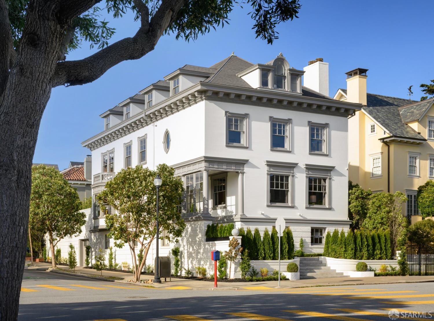 Sited on a prominent corner in Presidio Heights, this stately home offers the rare combination of sought-after scale, highly desirable family amenities, with a walk-out garden, and privacy. Built in 1909 and brought into the modern world by internationally acclaimed architect Robert A.M. Stern, the home sits commandingly above street level providing unexpected privacy and light throughout. A beautiful entry sequence guides visitors through lush greenery and into the glassed-in portico. Once inside, the home's grand scale is immediately evident with the center foyer filled with light and restored original architectural details. The main level is perfect for entertaining with the formal living and dining room, and a robust kitchen opening to the garden. The home's formal pedigree is beautifully balanced with elevated finishes, fixtures, and lighting, creating spaces equally suited for large-scale entertaining or family gatherings. Second level with primary suite, 2 large en-suite bedrooms, oak-clad office. Top level: 3 distinct rooms with city outlooks. Lower level hosts a game room, media room, and gym.  Boasting a walkout garden and sport court directly off the main level, this home epitomizes purpose, provenance, and the best family living can offer.