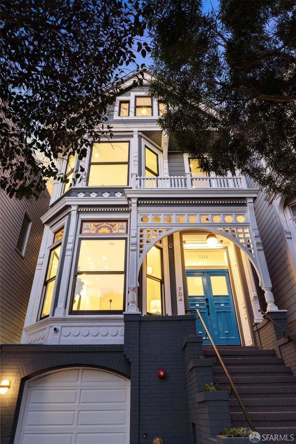 Nestled in San Francisco's vibrant Haight-Ashbury neighborhood, 704 Ashbury Street seamlessly merges historical charm with contemporary luxury. Originally built in 1890 and meticulously renovated down to the studs, this Victorian masterpiece spans 4 levels, an elevator to all levels and boasting 4,961 sqft with 5 beds, 4 full baths, and 2 powder rooms. Upon entry, the expansive open floor plan with 11+ feet high ceilings makes you instantly fall in love with the grand atmosphere. Living room offering an ethanol fireplace and original decorated windows exudes character and charm. Open concept kitchen, featuring custom cabinetry and high-end appliances, an extra-large center island. Your ultimate primary suite retreat is located on the top level - offering city views, a spa-like bathroom, a walk-in closet, an office space, and an exclusive laundry room. The Third level offers a family room, 4 beds, and 3 baths, a dedicated laundry room. Bottom level hosts an entertainment room with a wet bar,seamlessly connected to a low maintenance garden. Modern features include built-in speakers,Savant home automation,radiant heating, fire sprinklers, and EV charging. With its central location near parks and shops, this residence embodies the perfect blend of urban living and neighborhood charm.
