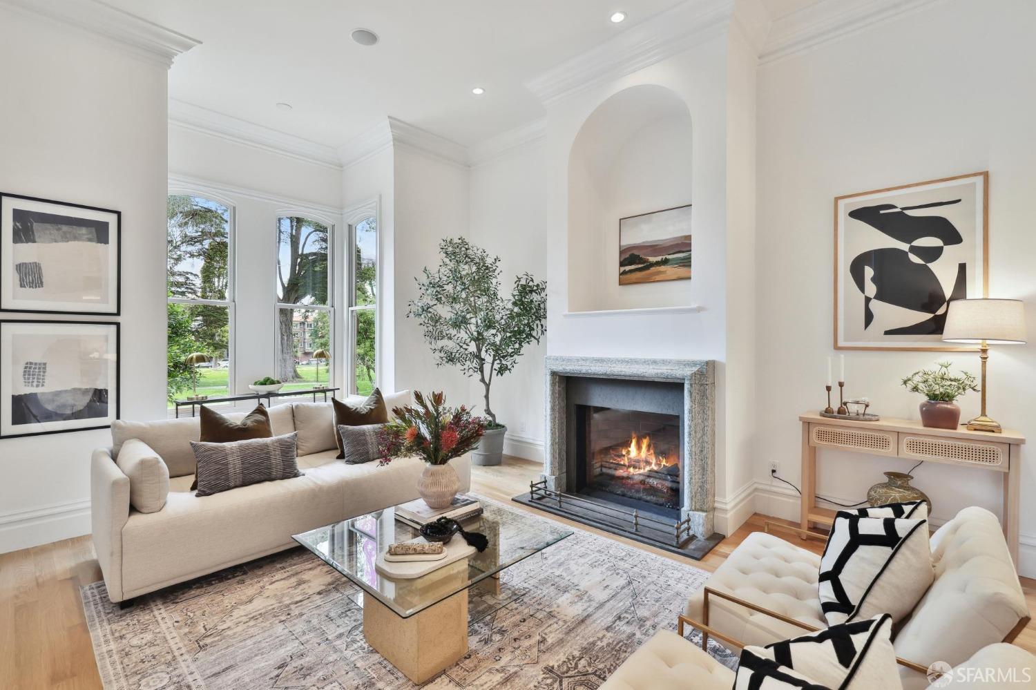 On the cusp of Cole Valley, Haight Ashbury and NOPA, this magnificent, 3 level, ~3,000+ sq ft, renovated Italianate Vic home w 3 ensuite BDRs on the top level, a roof deck, studio apartment/4th bedroom, parking for 2 cars, a 98 WalkScore, and a tranquil backyard oasis, is truly a rare find! Fab double parlor with soaring approx 12 ft ceilings and an antique marble fireplace. Carrara marble kitchen opens to family rm and Ipe deck/large level lush backyard. Sumptuous primary suite w luxe ensuite marble BA and private deck. Renovated studio apt w soaring ceilings, sliding doors to a private patio, a renovated tiled full bath, and a full kitchen w stainless appliances. Newer foundations, electrical, plumbing and roof. Verdant ~3436 square foot lot with a pro designed, resort style, backyard  think al fresco dining, dogs and children playing, grilling and relaxing. 2 car parking. A walker's paradise, this home's prime location offers world class restaurants, markets, coffee shops, and boutiques all within just a few blocks in any direction. Steps to iconic Golden Gate Park, Japanese Tea Garden, Conservatory of Flowers, dog park, tech shuttles, the N-Judah, and several MUNI stops. 94 BikeScore  ride easily to Ocean Beach. A forever home like this rarely comes to market!