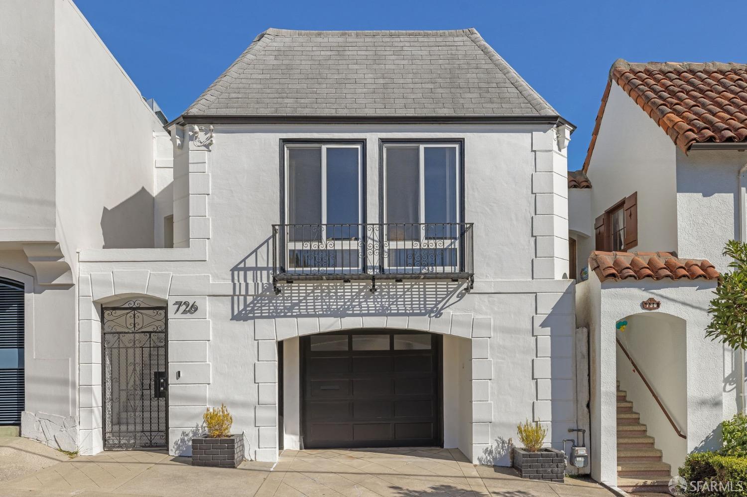 Built in 1941, this four-bedroom, two-bathroom 2,070 sqft center patio residence is set on a large 3,088 sq/ft lot with an additional 1,425 sq/ft adjacent lot that makes this a truly  special and unique offering in the city's fast growing and sought after Richmond  District neighborhood. The impressive homes main level has three bedrooms and one bathroom as well as a renovated kitchen and a spacious formal dining room that is adjacent to the light filled center patio. The main living space has vaulted ceilings and large west facing windows for afternoon light. The residences three bedrooms are located in the rear of the home with the primary bedroom having immediate access to the bathroom suite through an interior doorway. Downstairs in the rear of the massive lower level is an additional one bedroom, one bathroom suite with large living room. The impressive rear yard boasts a large patio as well as a built-in deck  with seating area and fire pit. The additional, adjacent 1,425 sq/ft lot sits just above the wooden deck and contains a flat yard with abundant plantings along its edge. This truly special offering is not to be missed.