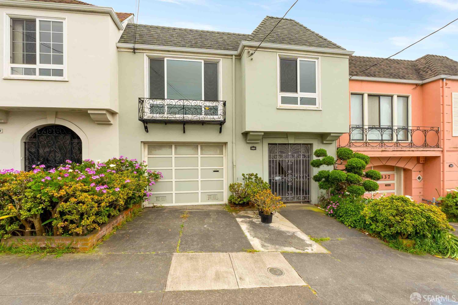 Located in one of the best neighborhoods of San Francisco just a quick walk to Golden Gate Park, this beautifully preserved 1950's home has aged gracefully and retained all its charm from the original and immaculate wooden floors to the lovely vintage kitchen. With only two owners in its history, the last having lived here over 50 years, this home is well taken care of and ready for a new owner who wants to make it their own.     Stretching over 1330 feet in space with unobstructed ocean views from the bedroom and yard, this is a calm oasis in the middle of the bustling city. The entry level features a tandem garage which can also be converted fourth bedroom while retaining one garage space and access to a terraced backyard. A guest bedroom with a full bath rounds out the ground floor. The second level contains the living room, kitchen, a full and separate dining room, two bedrooms, and a full bathroom. Host dinner parties or just enjoy your backyard landscaped retreat. This North-facing home gets sun all day long with skillfully placed skylights. Rarely does a home this size and well-preserved become available in the highly sought-after neighborhood of the Sunset District. With tons of potential and opportunity to customize it into your dream home, this is a must see!