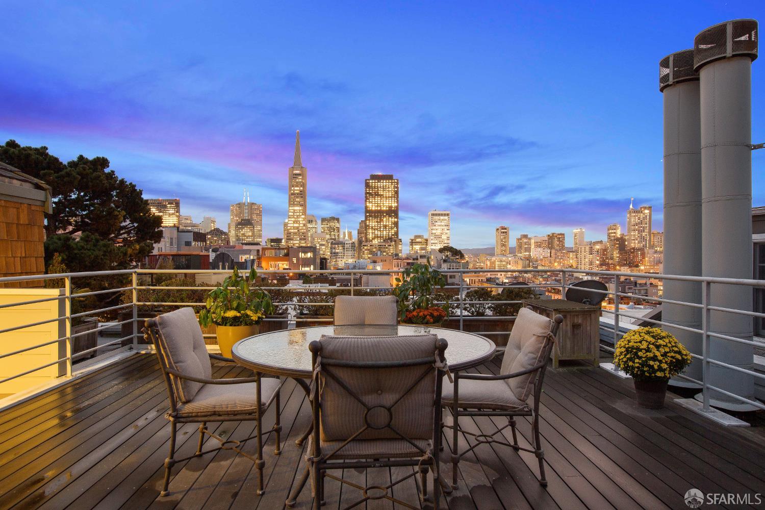 116 Alta San Francisco, California Sophisticated living, peaceful and serene in the heart of San Francisco. Nestled near iconic landmarks; Coit Tower and The Filbert Steps, just a few blocks from the Financial District, world-class dining, the Ferry Building, and endless city adventures. 116 Alta Street transforms the concept of urban living into a home that has been thoughtfully remodeled and extensively updated. The expansive primary suite boasts a cozy fireplace, a comfortable seating area, a wall of built-in cabinets and shelving, plus office space. Indulge in the spa-like bathroom featuring a soaking tub, double sinks, and a separate water closet. For your convenience, the extra-large walk-in closet includes a full-size washer and dryer. The upper level impresses with 10' ceilings and a spacious living/dining area adorned with a fireplace and generous natural light, complemented by downtown views. The light-filled kitchen is equipped with Bosch appliances and custom cabinets, opening up to a private yard. The second bedroom features pocket doors, allowing it to convert into a home office or gym. A custom full bathroom completes this level. What truly sets this home apart is the private roof deck, offering stunning views of downtown San Francisco. Garage leased parking +/- 500' on Union Street.