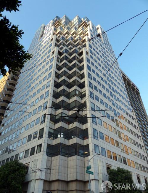 611 Washington San Francisco, California Montgomery Washington Tower's finest 2 bedroom, 2 bathroom on a single level unit with parking. This unit is 1 of only 32 exclusive residences, top of the building. Imagine residing on the border of Jackson Square in one of the city's most historic neighborhoods within walking distance to FiDi, the Ferry Building, Chinatown, North Beach, The Embarcadero, and so much more. The unit is very spacious at nearly 2,000 SF, with pleasant upgrades that include a gas fireplace, wide plank wooden floors, a chef's stainless kitchen and wet bar. Amenities include: 24-hour security, lap pool/ sundeck concierge desk, a private membership health club, private residential lobby with high speed elevators and more. Unit #2505 has East Bay views from the living room and dramatic Financial District views from all rooms. Interior upgrades include hardwood floors, recessed lighting and an all new kitchen w/granite counters and top appliances. Separate laundry room and home office complete with countertops and built-in storage cabinets.